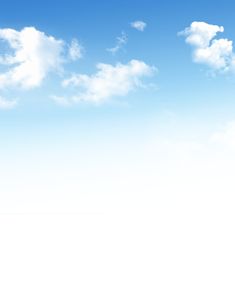 an airplane flying in the blue sky with white clouds