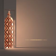 an illuminated bottle sitting in the middle of a room next to a doorway with a light coming through it