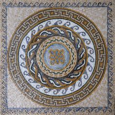 an artistic mosaic design in the center of a circle