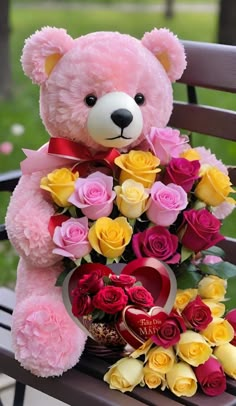 a teddy bear sitting on top of a wooden bench with roses in front of it