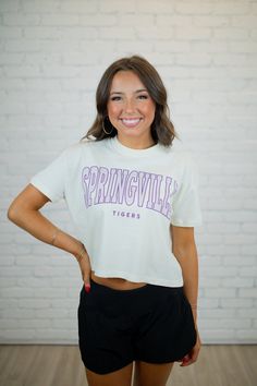 BEST SELLER! Gear up for gameday in our favorite mom crop tee! The soft wash and exclusive design make this tee an absolute must-have for cheering on your favorite team this season! Designed by Scarlet & Gold TTS; our model is wearing a small Slight crop; hits at the waist