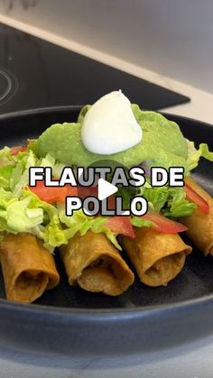 a black plate filled with food on top of a stove