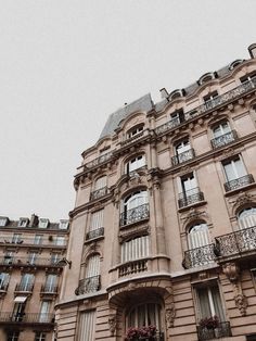 an old building with many balconies and windows