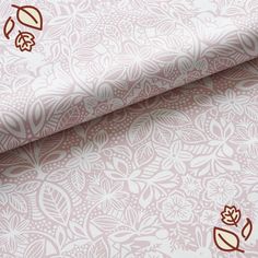 a pink and brown wallpaper with leaves on it