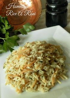 a plate with rice and parsley on it