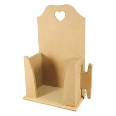 a wooden holder with a heart on it