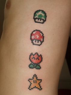 an image of some tattoos on someone's back that are pixelated and different colors