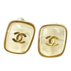 This is part of Chairish’s Costume Jewelry assortment.  Chanel Vintage Gold CC Clear Rectangle Stud Piercing Earrings  *Marked 01 *Made in France  -It is approximately 0.65" x 0.55". -It is very classic -In a very good condition Luxury Rectangular Jewelry Aaa Quality, Classic Rectangular Earrings For Anniversary, Luxury Clear Earrings For Formal Events, Classic Oblong Earrings For Formal Occasions, Modern Rectangular Wedding Earrings, Elegant Rectangular Clip-on Earrings For Formal Events, Luxury Square Earrings For Formal Occasions, Gold Square Cut Earrings For Formal Occasions, Elegant Yellow Rectangular Earrings