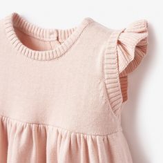 This garden picnic knit baby dress is giving us all the feels! A sweet blush pink colored fine knit is the perfect weight for spring weather. Pom-pom cotton tail adds the right touch of whimsy to this already adorable luxury baby dress. Pair with a linen toy or coordinating garden picnic blanket to make the ultimate baby gift set. 100% cotton knit baby dress A-line silhouette with flutter sleeve Pom Pom cotton tail detail Includes diaper cover/bloomer Machine wash cold, tumble dry low Planet Clothing, Baby Gift Guide, Knit Baby Dress, Garden Picnic, Elegant Baby, Luxury Baby, Spring Weather, The Feels, All The Feels