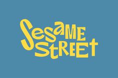 the words sesame street written in yellow on a blue background