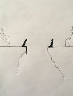 two people are sitting on the edge of a cliff and one person is climbing up