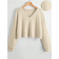 -Item Id 41645879 -Details: Rib-Knit -Sleeve Type: Drop Shoulder -Style: Casual -Hem Shaped: Regular -Color: Beige -Pattern Type: Plain -Neckline: V Neck -Sleeve Length: Long Sleeve -Length: Regular -Fit Type: Loose -Fabric: Non-Stretch -Material: Knitted Fabric -Composition: 97% Polyester, 3% Elastane -Care Instructions: Machine Wash Or Professional Dry Clean -Sheer: No **Open To Offers!!!** **Bundle To Save More** **30% Off Bundles Of 2 Or More Items!!** ***Orders Go Out Within 5-10 Business D Beige Ribbed V-neck Top, Solid Color Knit V-neck Top, Beige Cotton V-neck Knit Top, Beige Ribbed V-neck Sweater, Beige Solid Color V-neck Top, Casual V-neck Knit Top With Ribbed Neckline, Trendy Beige V-neck Knit Top, Casual Ribbed V-neck Knit Top, Beige Knit V-neck Top