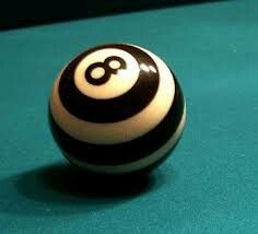 a pool ball with the number eight on it