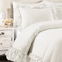 This comforter set will add a touch of feminine style to any bedroom or dorm room. The lace trim and layers of ruffles add flair to an otherwise minimalist look that can also fit into the farmhouse. Lush Decor Size: Twin XL Comforter + 1 Standard Sham, Color: White | Lush Decor Ella Shabby Elegance Ruffle Lace Microfiber Comforter Set Microfiber in White | Twin XL Comforter + 1 Standard Sham | Wayfair | Home Decor Sheets For Bed, White Ruffle Bedding, Farmhouse Color, Dream House Bedroom, College Room