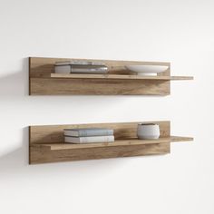 two wooden shelves with books and bowls on them