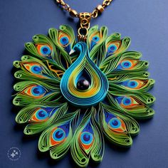 a necklace with a peacock design on it