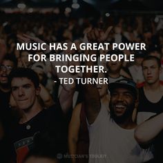 a group of people standing in front of a crowd with the words music has a great power for bringing people together - ted turner