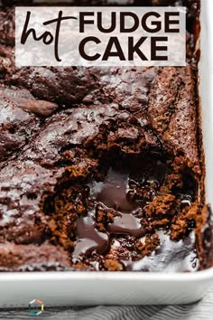 chocolate fudge cake in a white dish with the words hot fudge cake above it