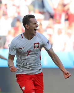 a male soccer player is celebrating his team's win over the us state of washington