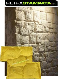 two yellow bags sitting next to each other in front of a stone wall with the words,