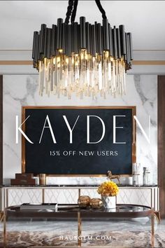 a chandelier hanging from the ceiling in front of a blackboard that says kayden 15 % off new users