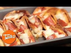 several slices of pizza sitting on top of a pan covered in cheese and pepperoni