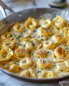 a skillet filled with macaroni and cheese