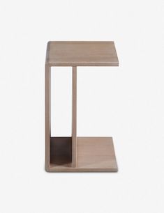 the side table is made out of wood and has a square shelf on one end