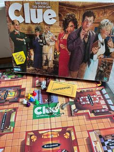 the clue board game is laying on its side