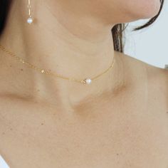 You'll love the simplicity and elegance of our Alana pearl choker. Perfect for a bride or her bridesmaid, this stylish choker features a freshwater pearl that adds subtle sparkle to your everyday look. P R O D U C T * D E T A I L S  *      Genuine Freshwater pearls 5mm  *Your choice of ∙ Sterling Silver ∙ 18K Gold Filled  *Custom Chain 14 -18 inches  *Hypoallergenic, lead-free & nickel-free. ** Our freshwater pearls are carefully selected, size, shape, and color may slightly vary due to their natural nature, no two are exactly alike. ♥ Our Pearl Necklaces Collection: https://etsy.me/3V3x11w ♥ Our Pearl Earrings Collection: https://etsy.me/4ciNoxs ♥    Check Our Shop here https://etsy.me/3V4InCp P A C K A G I N G + D E L I V E R Y Each item in our Collection is made to order especially for Bridal Jewelry Gold, Necklaces Collection, Floating Pearl Necklace, Dainty Necklace Layered, Custom Chain, Pearl Bridal Jewelry, Natural Nature, Hair Accessories Gift, Pearl Necklaces