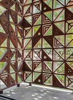 the inside of a building with many wooden structures on it's sides and windows