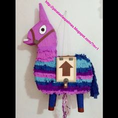 a purple and blue llama hanging on the wall