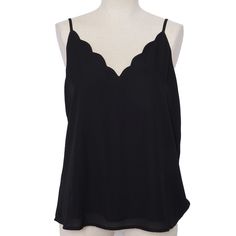 Look stunning in the Socialite Tank. This glamorous black tank features a scalloped edge, adjustable spaghetti straps, and flattering v-neck. With its classic design, you can wear it perfectly for any occasion, easy to dress up or down, tucked in or untucked, looks great by itself or with a blazer. Polyester Excellent condition, no signs of wear. Size: M Measurements: Bust 36 in / 91 cm Waist 40 in / 102 cm Length 21 in / 53 cm Our best price available will always be on our website. All items are in good to excellent, pre-loved condition. If you have questions or would like to see more photos, send me a message. Your happiness, satisfaction, and confidence in the products are important to me. Check out our store for many more luxury and vintage items! To stay up to date with new arrivals, Summer Tank, Black Tank, Scalloped Edge, Luxury Women, Summer Top, Womens Tank, Womens Clothing Tops, Classic Design, Looks Great