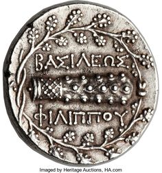 an ancient coin with the inscription,'baaemoss and nittoo '