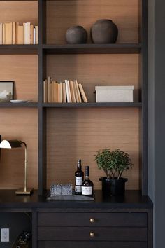 Custom office built-in staged with pottery, books, whiskey glasses, art, brass accents & plants. Small Masculine Office, Modern Home Office For Women, Max Strus, Shelf Staging, Nook Office, Smyrna Tennessee, Moody Office