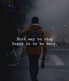 a man walking down the street with his back to the camera and text that reads best way to stay happy is to be busy