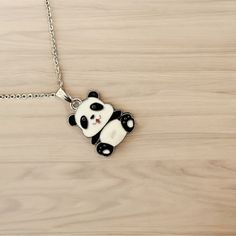 Introducing Our Adorable Black And White Baby Panda Bear Charm Necklace, A Charming Addition To Your Jewelry Collection! Crafted From Silver Plated Alloy And Adorned With Intricate Black And White Enamel Detailing, The Panda Pendant Captures The Essence Of These Beloved Creatures In A Delightful Miniature Form. This Necklace Features An 18-Inch Silver Plated Stainless Steel Link Chain With A Secure Lobster Clasp, Ensuring Both Style And Durability. The Panda Charm Itself Measures A Dainty 20 Mm Cute Handmade Black Necklace, Cute Handmade Black Necklaces, Casual White Necklaces For Gifts, Panda Pendant, Panda Necklace, Panda Charm, Animal Themed Jewelry, Baby Panda Bears, Black And White Baby