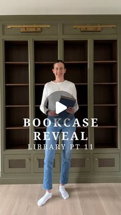 a man standing in front of a bookcase with the words, bookcase reveal library pt