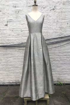 Pewter V neck Silk Shantung Ball Gown Dress Elegant Fitted V-neck Ball Gown, Elegant A-line Ball Gown For Prom Season, Wedding Ball Gown With Pleated Bodice And A-line Shape, Elegant Silk V-neck Gown, Classic Formal Gown With Pleated Bodice, V-neck Maxi Dress With Pleated Back For Wedding, Classic A-line Evening Dress With Fitted Bodice, Elegant V-neck Maxi Dress For Mother Of The Bride, Elegant Silk Ball Gown With Pleated Bodice