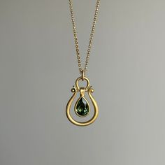 Small Gold Lyre Pendant with Green Tourmaline Pear – Meeka Fine Jewelry Lyre Design, Newport Ri, Jewelry Lookbook, Deep Forest, Gems Jewelry, Green Tourmaline, Bracelet Gift, Ring Necklace, Jewelry Care