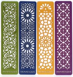 four different types of laser cutouts in various colors and shapes, each with an intricate design