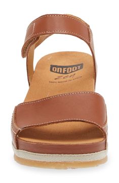 A leather-wrapped platform raises this sandal that offers total comfort with a contoured footbed that targets pressure points to relieve tension and stress. 1 1/2" heel; 1/2"platform (size 39) Adjustable hook-and-loop strap Zen footbed massages pressure points as you walk to relieve stress in the muscles and increase circulation Leather upper/synthetic lining and sole Made in Spain Women's Shoes Massage Pressure Points, Increase Circulation, Earth Shoes, Pressure Points, Leather Shoes Woman, Shoes Woman, Platform Sandals, Leather Sandals, Leather Shoes