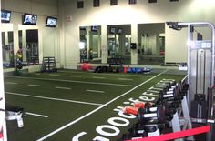 the inside of a gym with rows of chairs