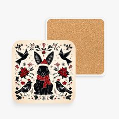 a coaster with a rabbit and birds on it