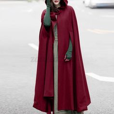 Solid Hooded Cape For Fall, Winter Outdoor Cape, Oversized Hooded Cape For Outdoor, Oversized Hooded Outdoor Cape, Oversized Solid Color Cape, Hooded Poncho For Cold Weather And Fall, Hooded Poncho For Cold Weather In Fall, Casual Hooded Winter Cape, Solid Hooded Jacket With Detachable Hood For Fall