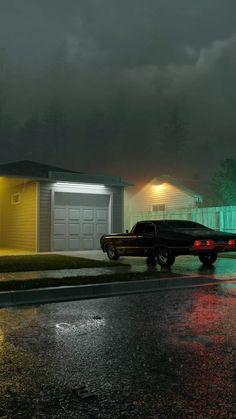 a black car parked in front of a house on a rainy night with the lights on