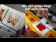 an image of someone cutting out paper with scissors and glue on the edge of a book