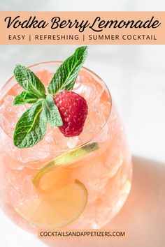 a close up of a drink in a glass with ice and strawberries on the rim