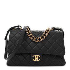 This is an authentic CHANEL Shiny Sheepskin Quilted Large Trapezio Flap in Black. This stylish shoulder bag is crafted of luxurious diamond quilted sheepskin leather in black. This shoulder bag features an aged brass link chain top handle, an optional, adjustable black leather shoulder strap, and an aged brass classic CC turn lock on the crossover flap. This opens to a partitioned burgundy fabric interior with zipper pockets. Classic Phones, Chanel Crossbody, Burgundy Fabric, Chanel 19, Chanel Tweed, Denim Quilt, Quilted Wallet, Chain Top, Chanel Shoulder Bag