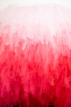 Host a stunning quinceañera or coquette-themed party with a pink ombre tulle fringe backdrop! This whimsical decor creates a dreamy, magical atmosphere, perfect for birthdays or elegant events. Ideal for event planners and hosts wanting to make a statement with soft, romantic decor. Explore ideas to make your celebration unforgettable with pink tulle!